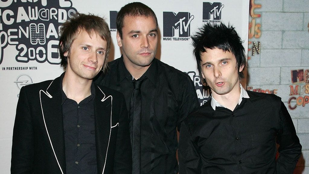 Muse-yhtyeen jäsenet Chris Wolstenhome, Dominic Howard ja Matt Bellamy.