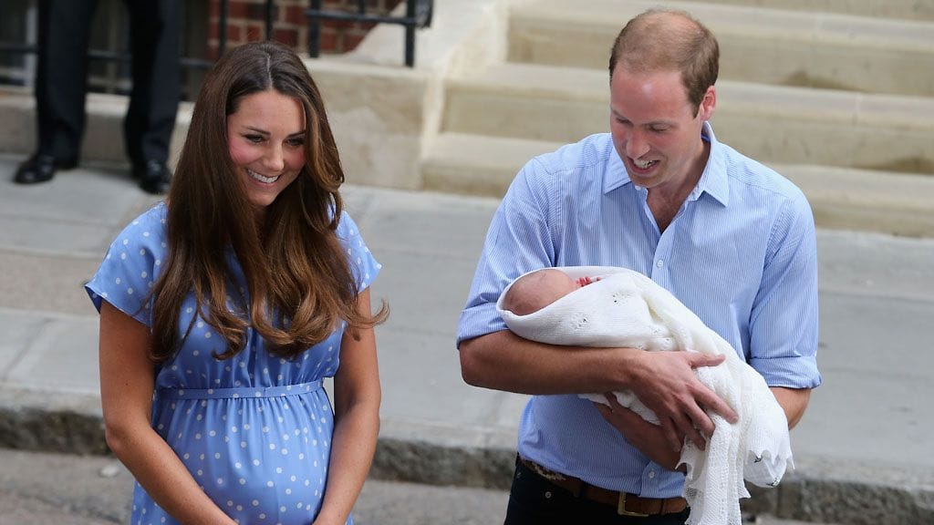 Kate Middleton ja prinssi William poikansa Georgen kanssa viime kesänä.