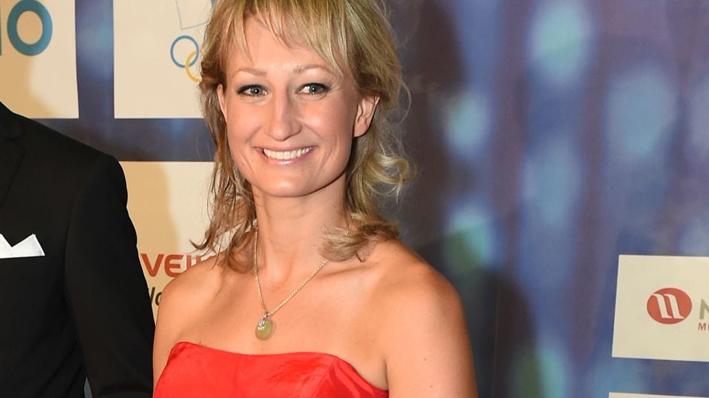 Tanja Poutiainen saapui Urheilugaalaan hyväntuulisena.