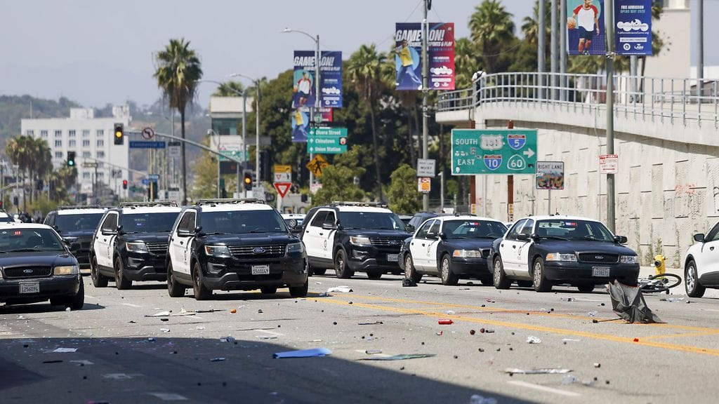A street covered in debris from a protest against immigration enforcement policies near the Edward R. Roybal Federal Building in Los Angeles, California, USA, 08 June 2025.
